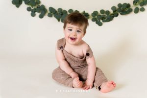 Cute bohemian cake smash for twins by Reno Baby Photographer