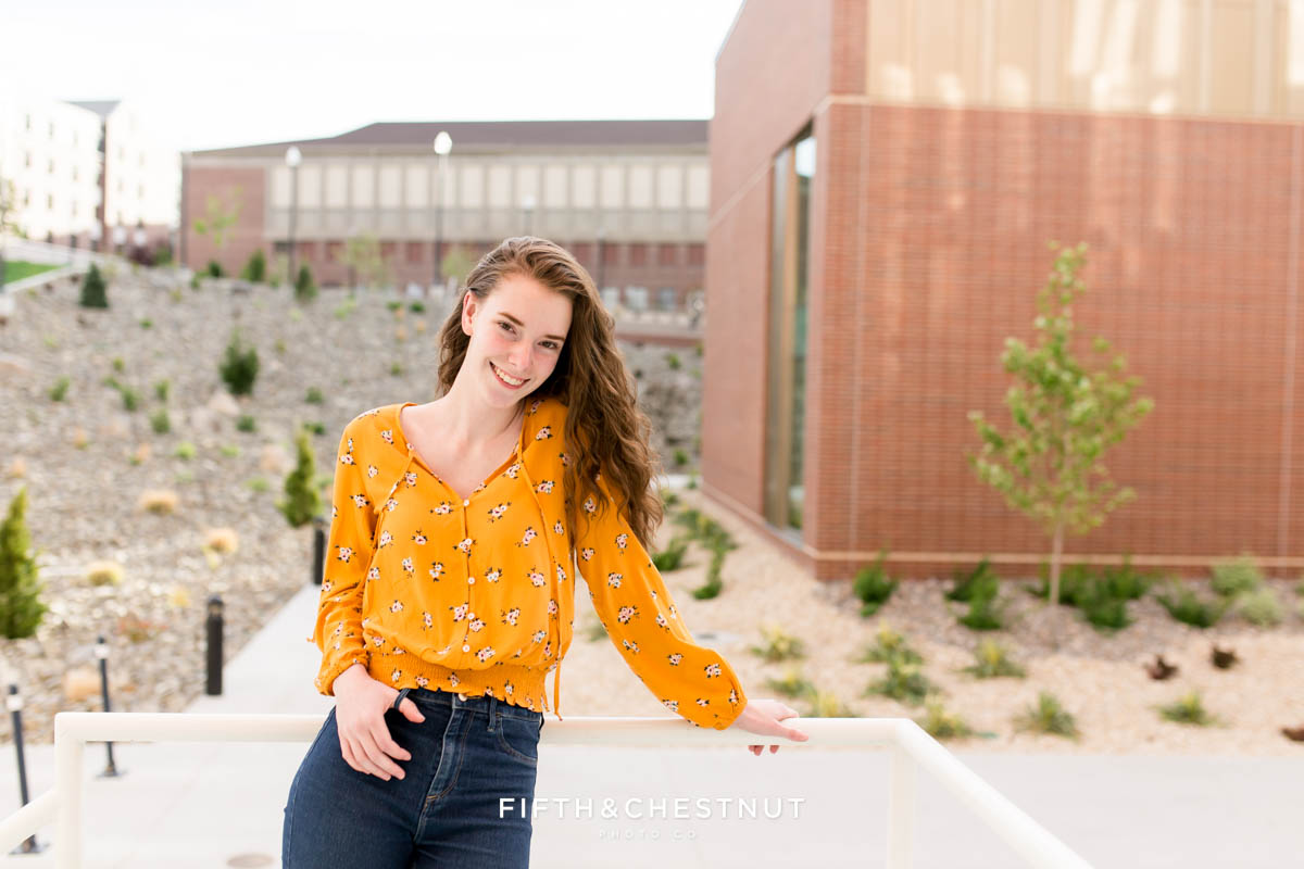Fun and edgy spring Reno High School Portraits by Reno HIgh School Senior Photographer at UNR on a windy spring day.