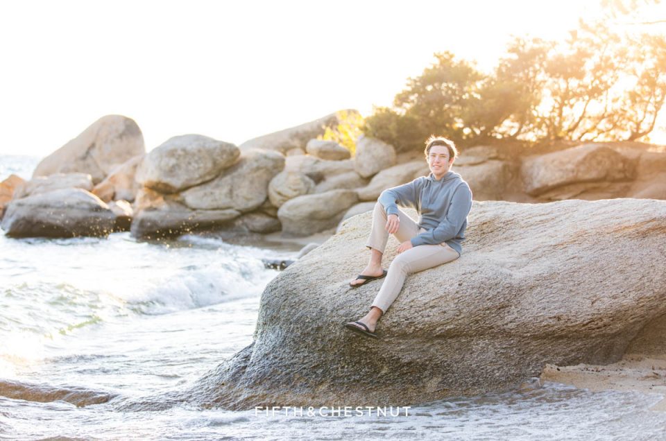 Lake Tahoe High School Senior Portraits at Hidden Beach on Rock by the Splashing Waves