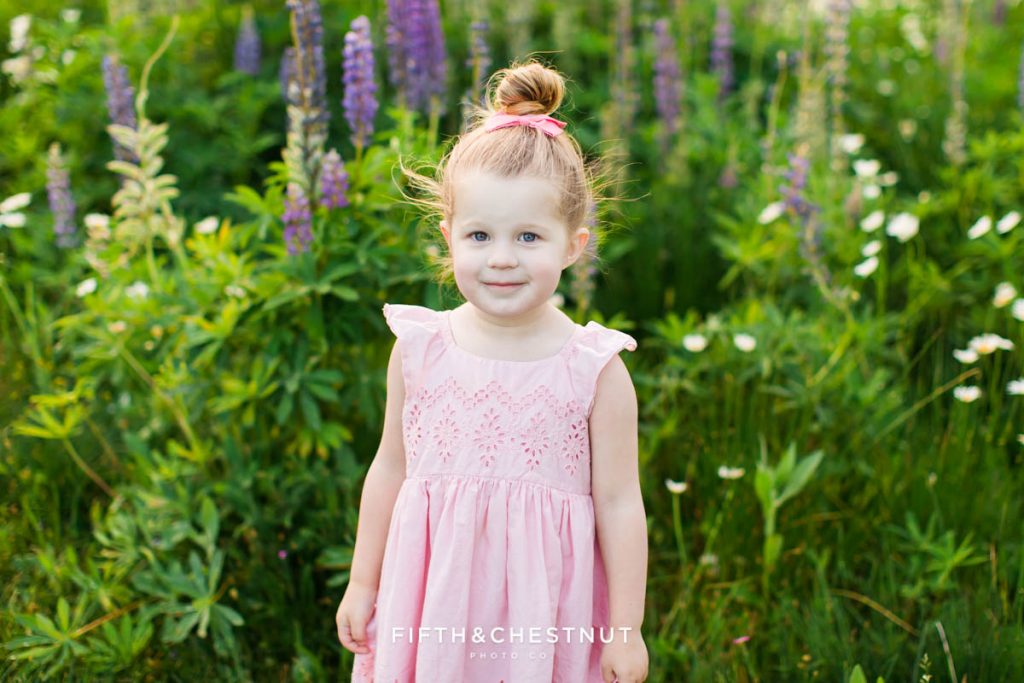 Purple & Pink Spring wildflower child portraits by Reno Child Photographer