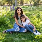 Spring wildflower portraits of sisters by Reno Family Photographer during the lupine superbloom