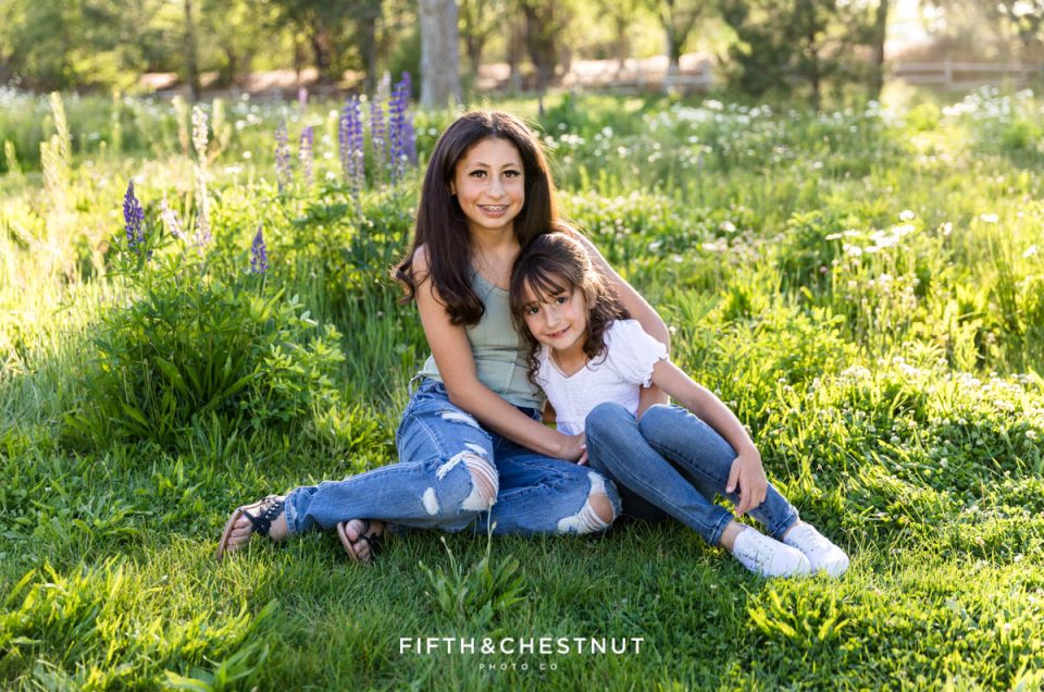 Spring Wildflower Portraits of Sisters by Reno Family Photographer