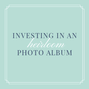 A mint green graphic that says "investing in an heirloom photo album" to showcase the benefits of purchasing a high-quality photo book or album for your family portraits