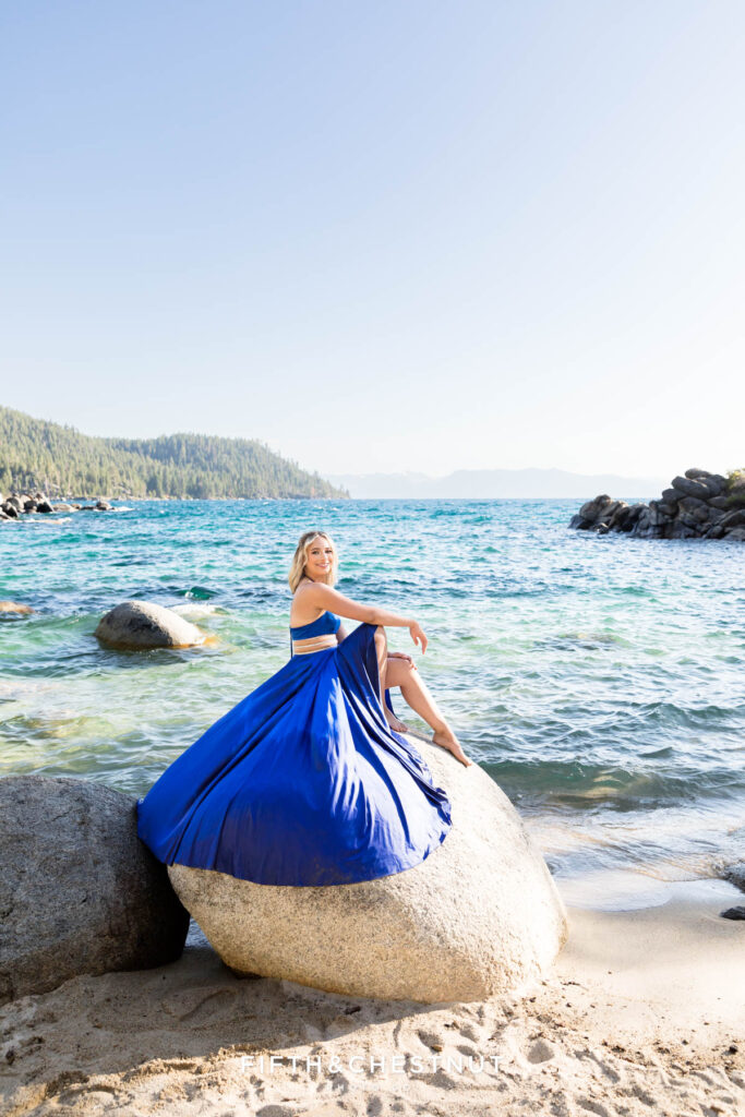 Stunningly gorgeous elegant summer senior portraits of Emma on the rocks at Secret Cove at Lake Tahoe by Lake Tahoe Senior Photographer
