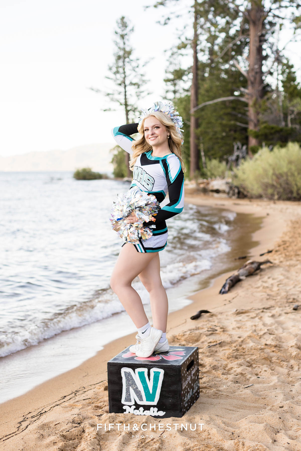 Senior cheer portrait on Kiva Beach in North Valleys High School uniform