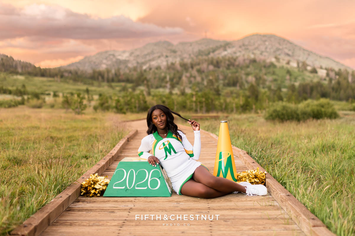 Cheerleader senior portraits with pom poms and megaphone – Reno Tahoe senior photos